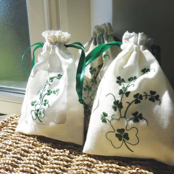 https://samuellamont.com/assets/products/_600x600_crop_center-center_61_line/Shamrock-Window-Drawstring-Bag-Filled-2.jpg