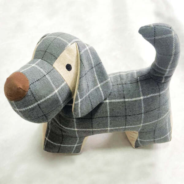 Grey dog outlet doorstop